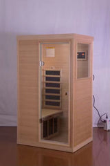 Hemlock Mini one person far infrared door on the Right of the indoor sauna room