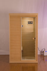 Hemlock Mini one person far infrared door on the Right of the indoor sauna room